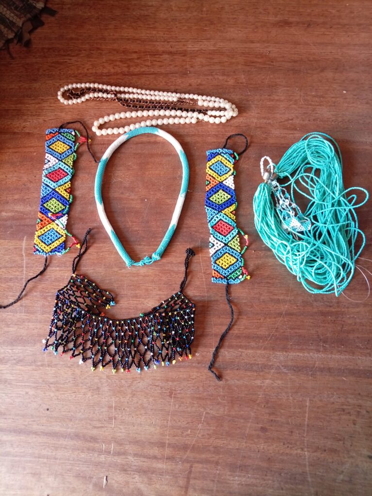 Mixed lot: 6 costume beaded necklaces, chokers & tassel strands — colourful hand-beadwork, faux pearls