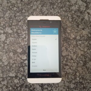 BlackBerry smartphone – boots to setup screen, white textured rear, rear-cover crack, untested
