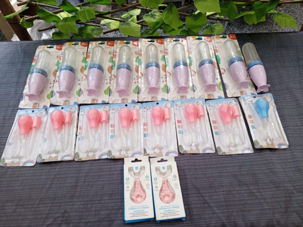 Joblot Mixed Baby Care Items – Silicone Rice-Paste Bottles & Pink Care Sets (≈22pcs)