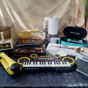 Mixed lot of small appliances & electronics (9 visible) — sold as-is, for parts/repair