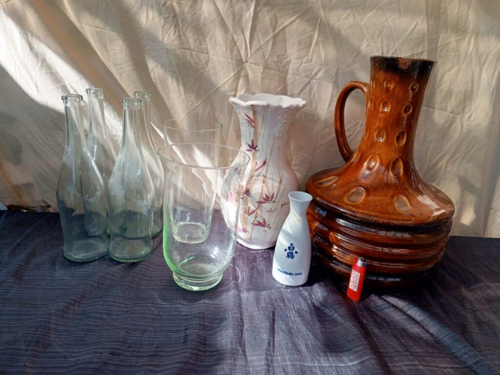 Mixed lot of 8 vases & bottles — decorative glass and ceramics, some chips/cracks
