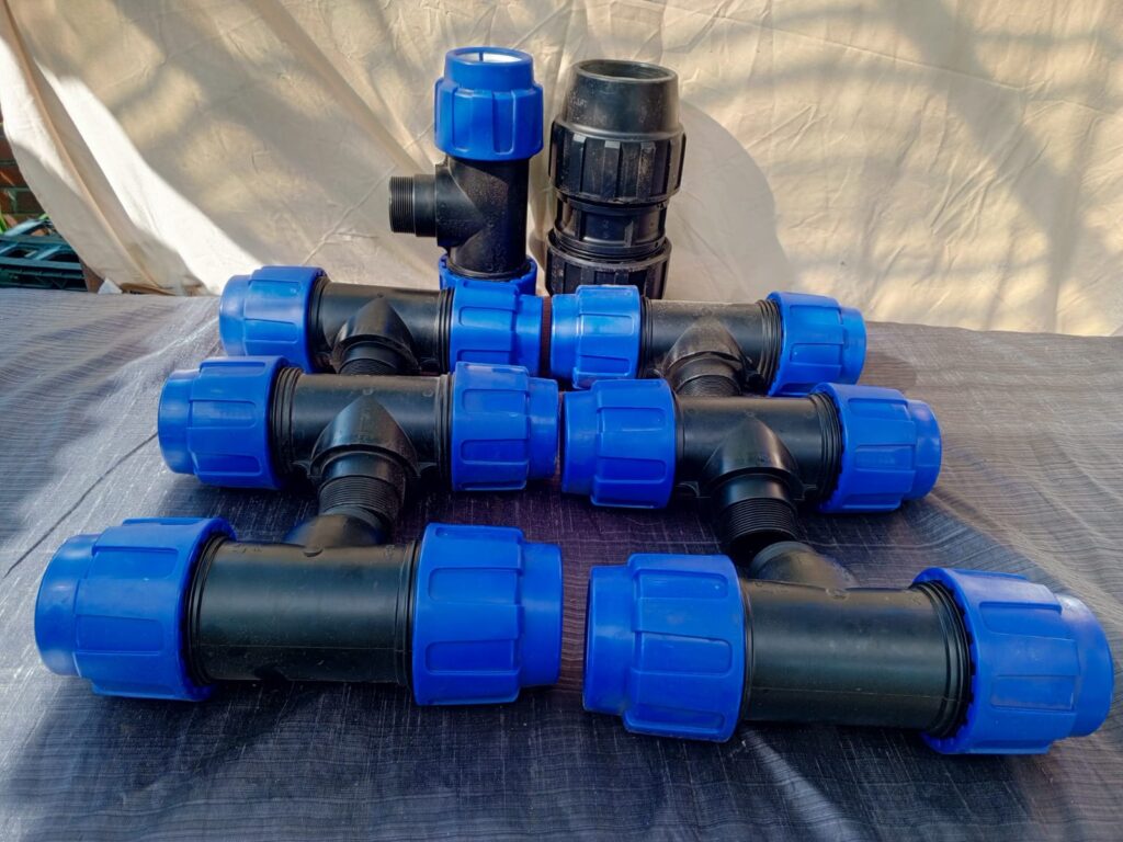 Set of 8 Black T Pipe Fittings with Blue Compression Nuts (embossed ’63-2′)