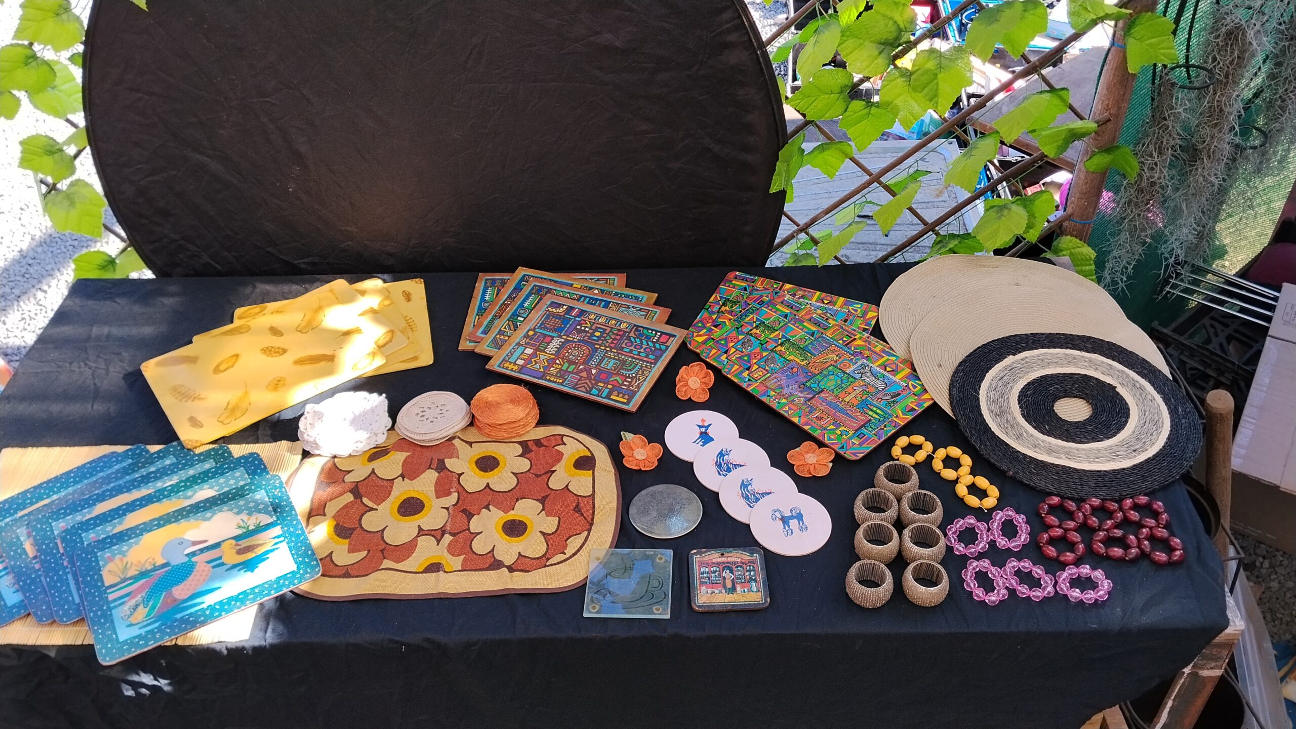 Mixed lot of decorative placemats, coasters & napkin rings — approx. 30–40 pieces