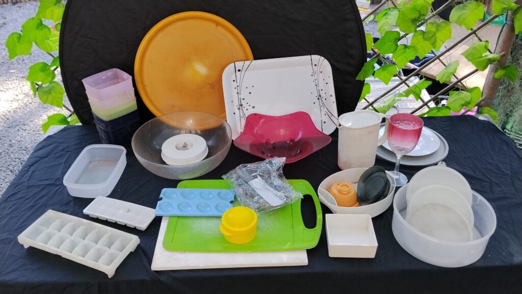 Mixed Lot of Approximately 25–30 Plastic Kitchenware Pieces (Orange Accents)
