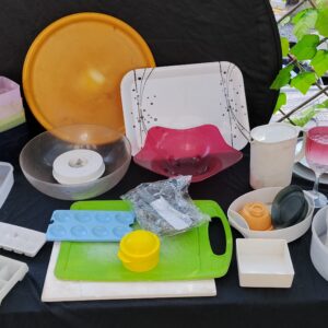 Mixed Lot of Approximately 25–30 Plastic Kitchenware Pieces (Orange Accents)