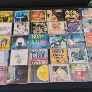 Mixed lot of approx. 37 music CDs with 2 video discs — assorted covers in jewel cases
