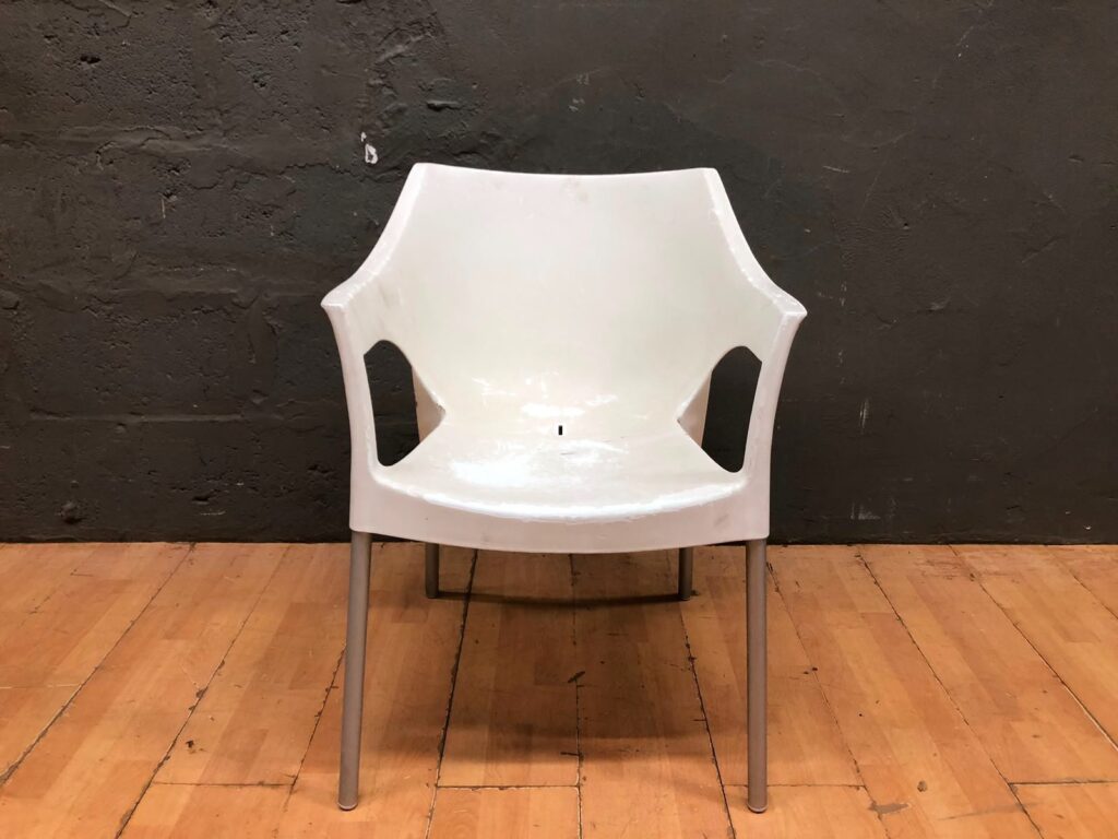 Old Plastic Chair with Metal Legs – Heavy Wear, Needs Attention