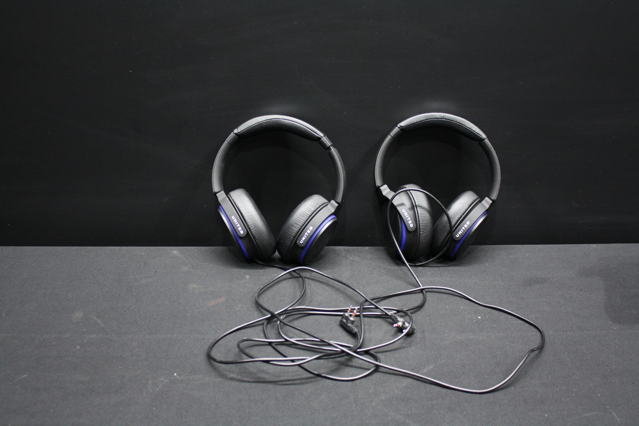 Pair of UNITED wired over-ear headphones (with MERIDIAN marking)