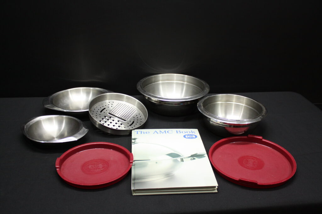 Set of A.M.C. steel kitchen bowls with grater, 2 red lids & AMC booklet (8 pcs)