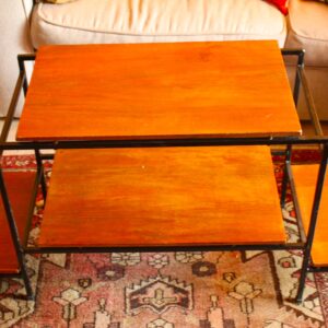 Wood-top TV stand with black metal frame — used, surface wear