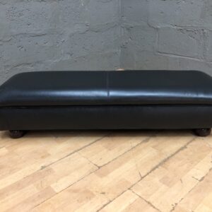 Black low rectangular upholstered ottoman / bench