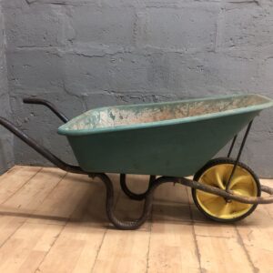 Used Single-Wheel Wheelbarrow — Green Tub, Rusted Metal Frame