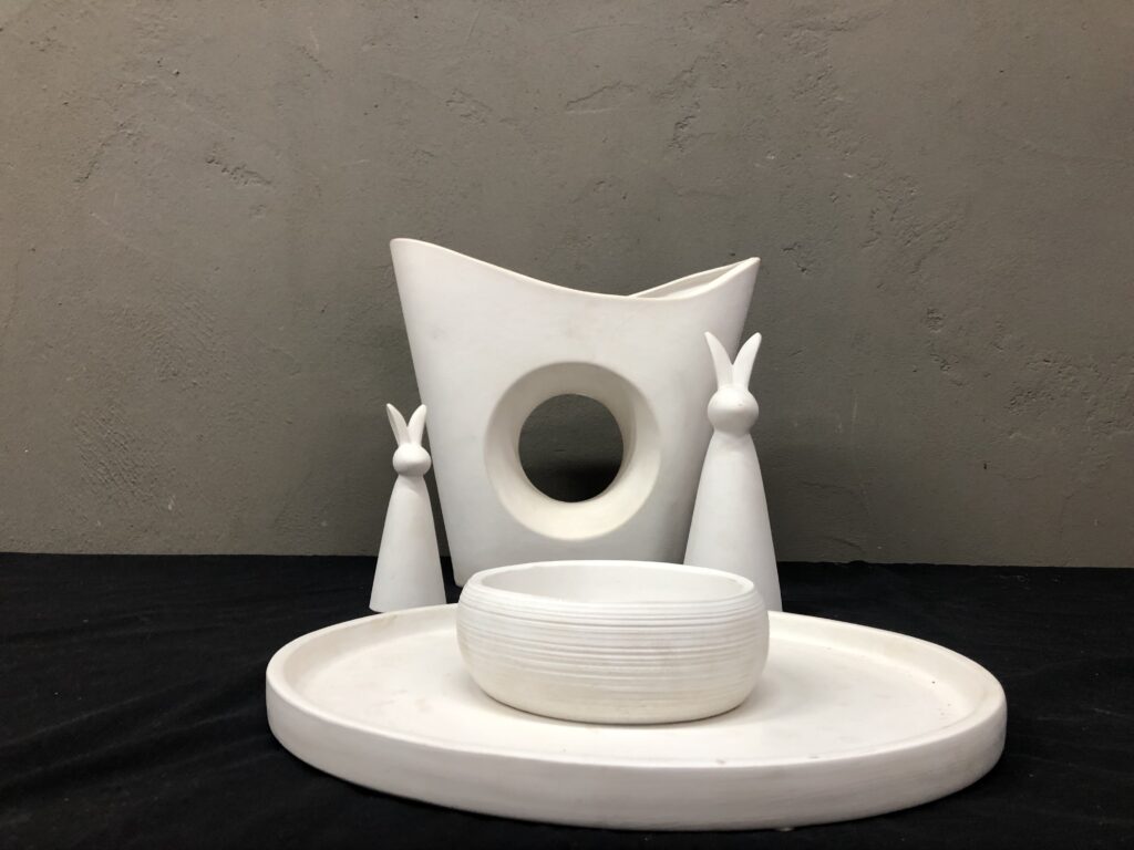 Five-piece white decorative set: vase with hole, tray, small bowl & 2 rabbit figurines