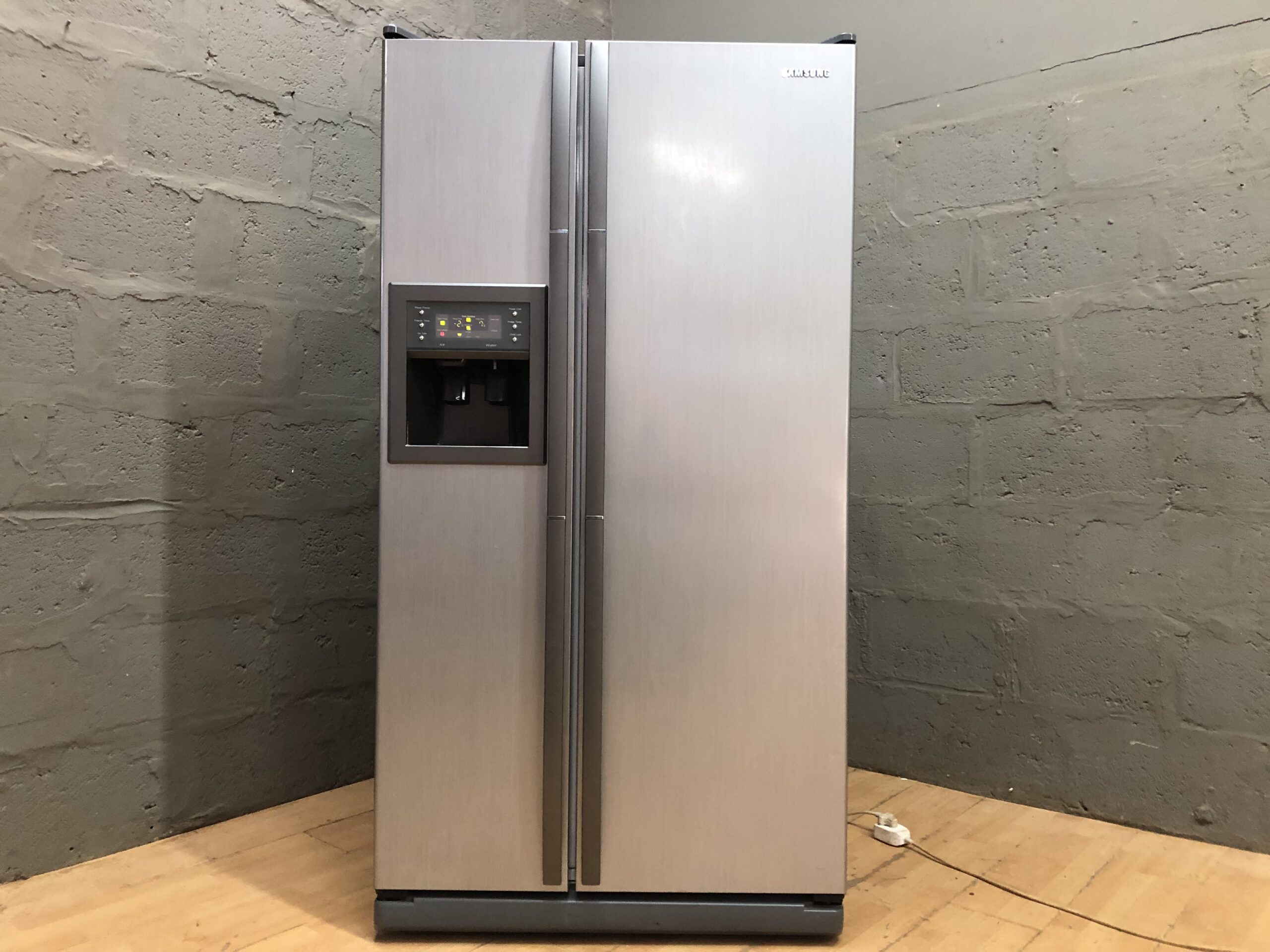 Samsung side-by-side refrigerator with external ice & water dispenser, silver finish