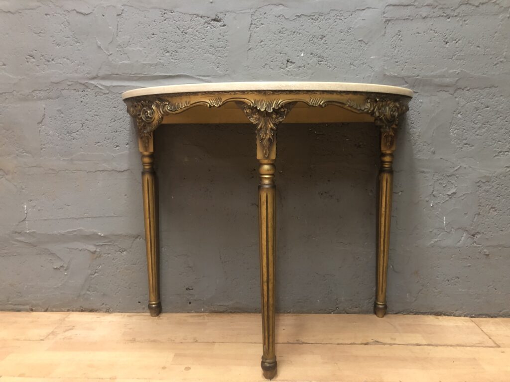 Demi-lune (half-moon) gilt console table with cream top — 1 piece