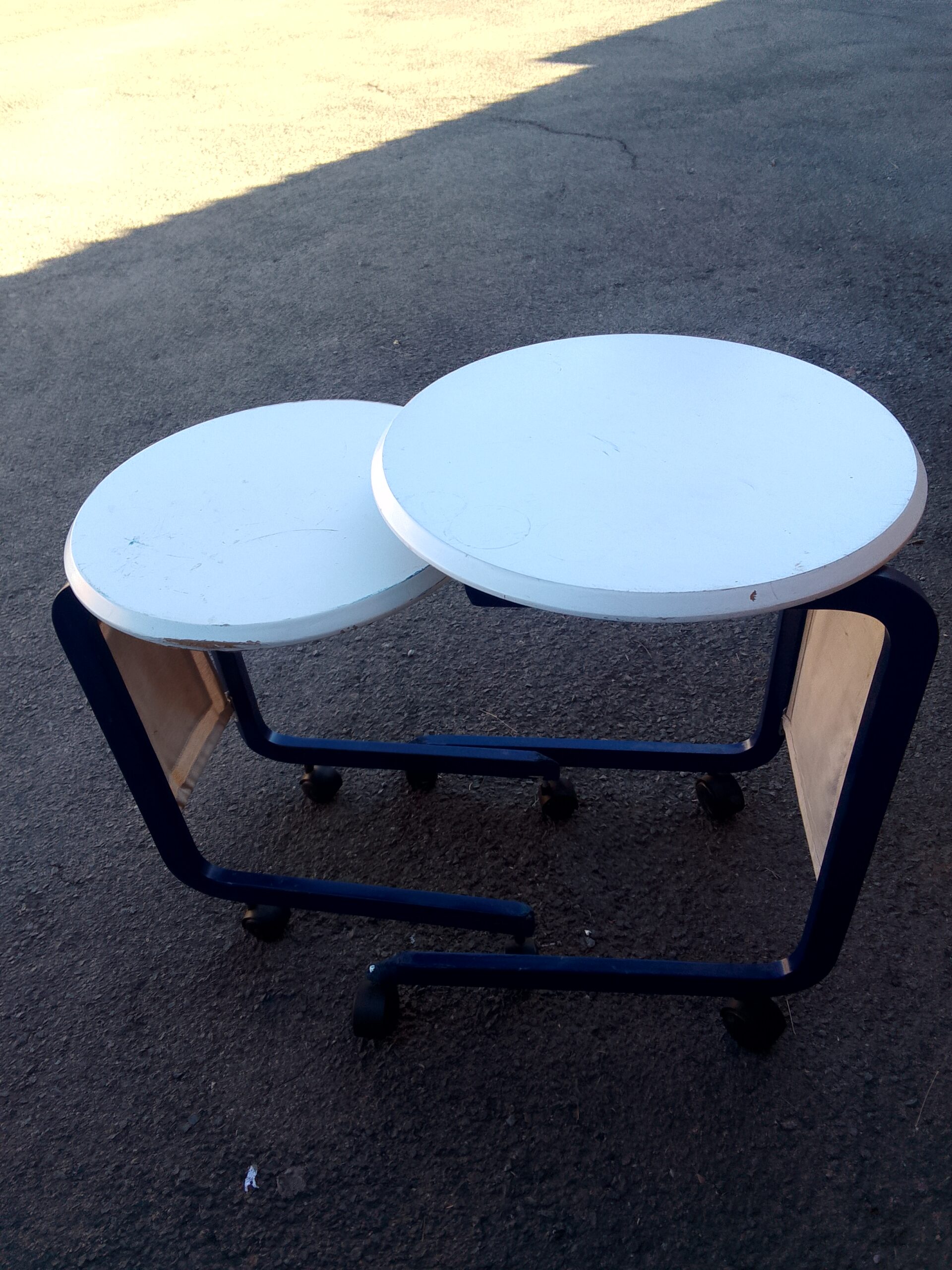 Pair of Round Wheeled Nesting Side Tables – White Tops, Dark Frames