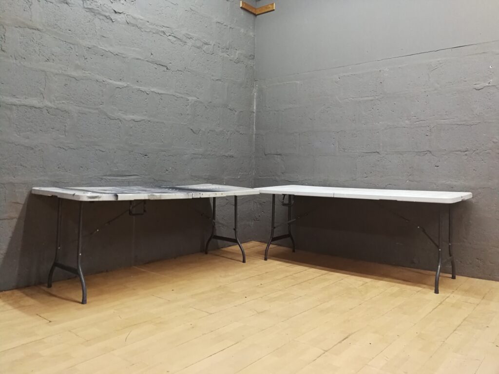 2 x Folding rectangular tables with hinged centre – heavy surface damage, 177×74×73cm