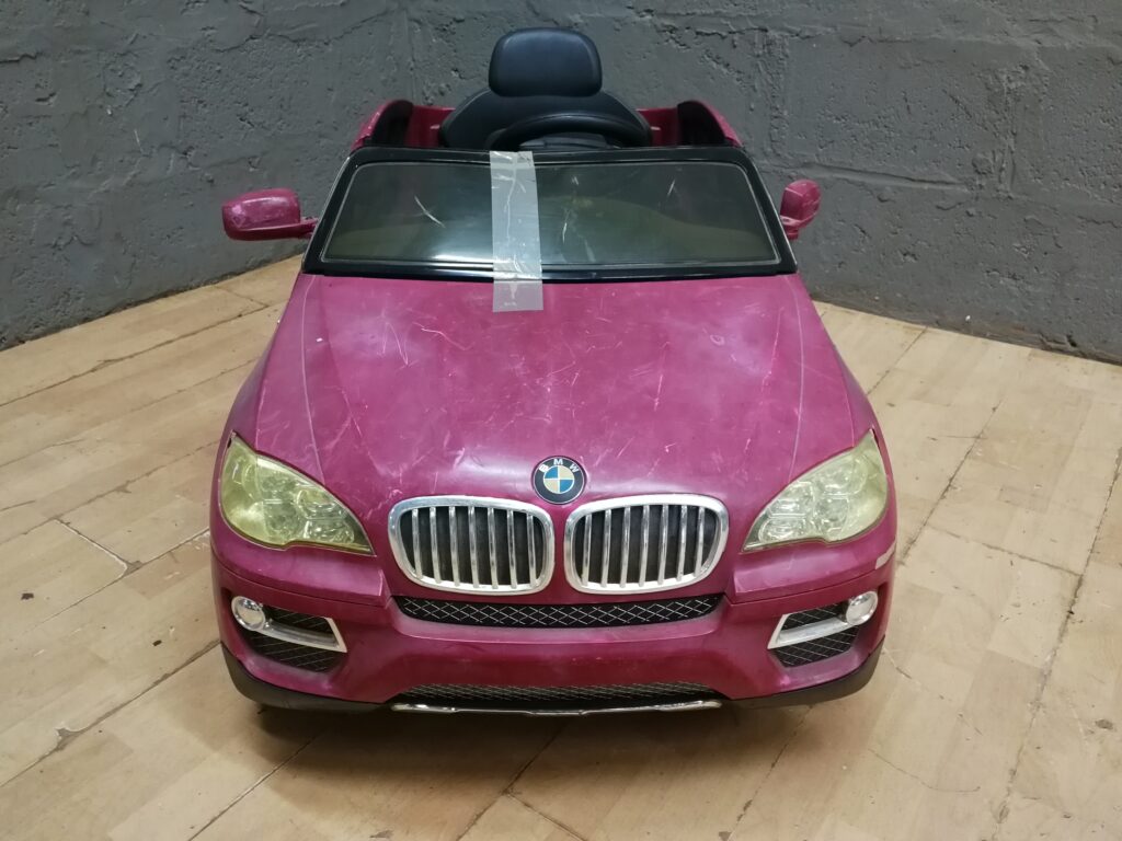Pink Children’s Ride-On Toy Car (BMW logo) — For Parts / Salvage