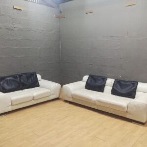 Pair of Off-White Upholstered Sofas (Set of 2) with 2 Loose Black Cushions
