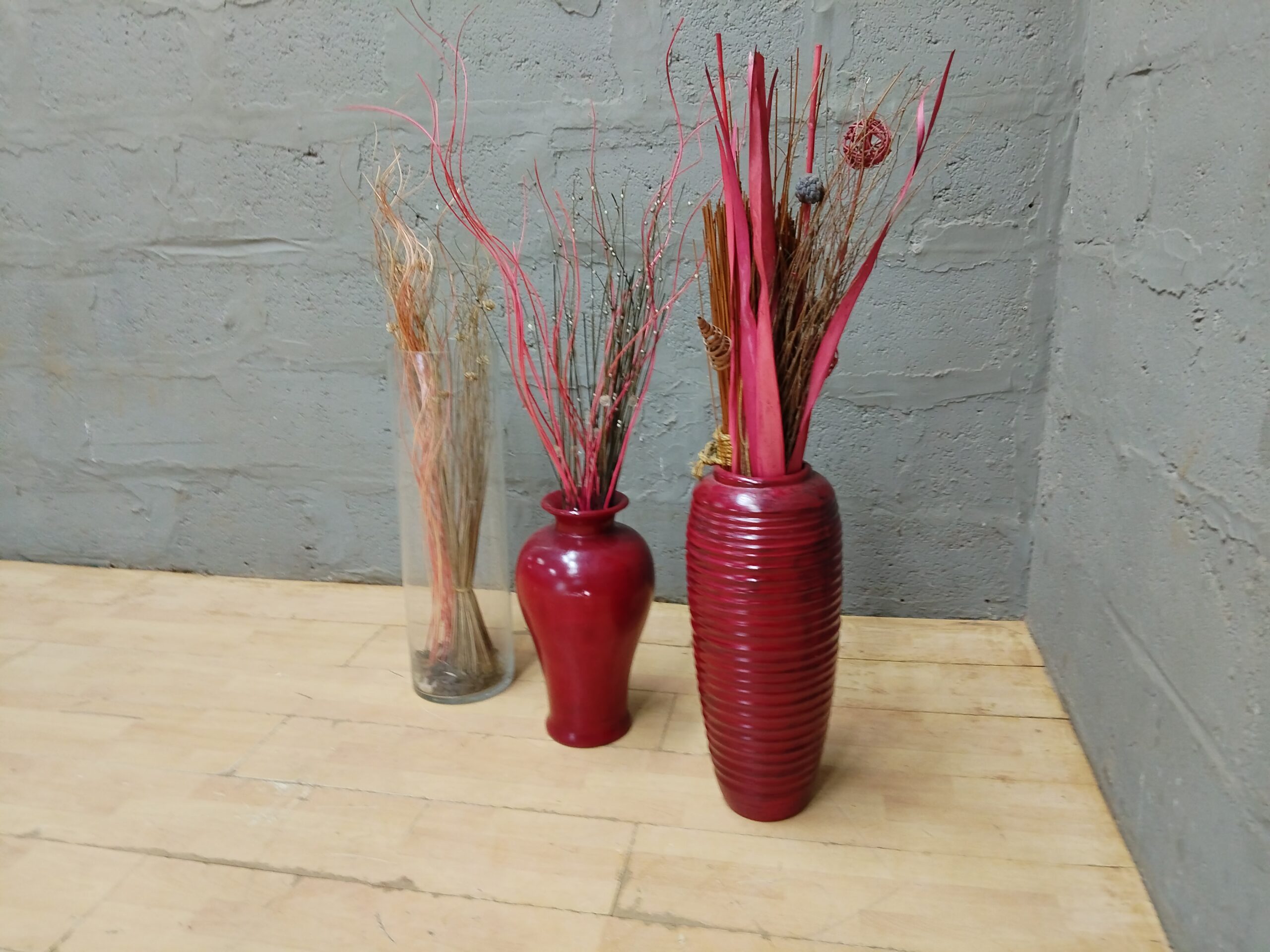 Set of 3 Decorative Vases with Dried Stems — Tall Ribbed Red, Short Red & Clear Glass