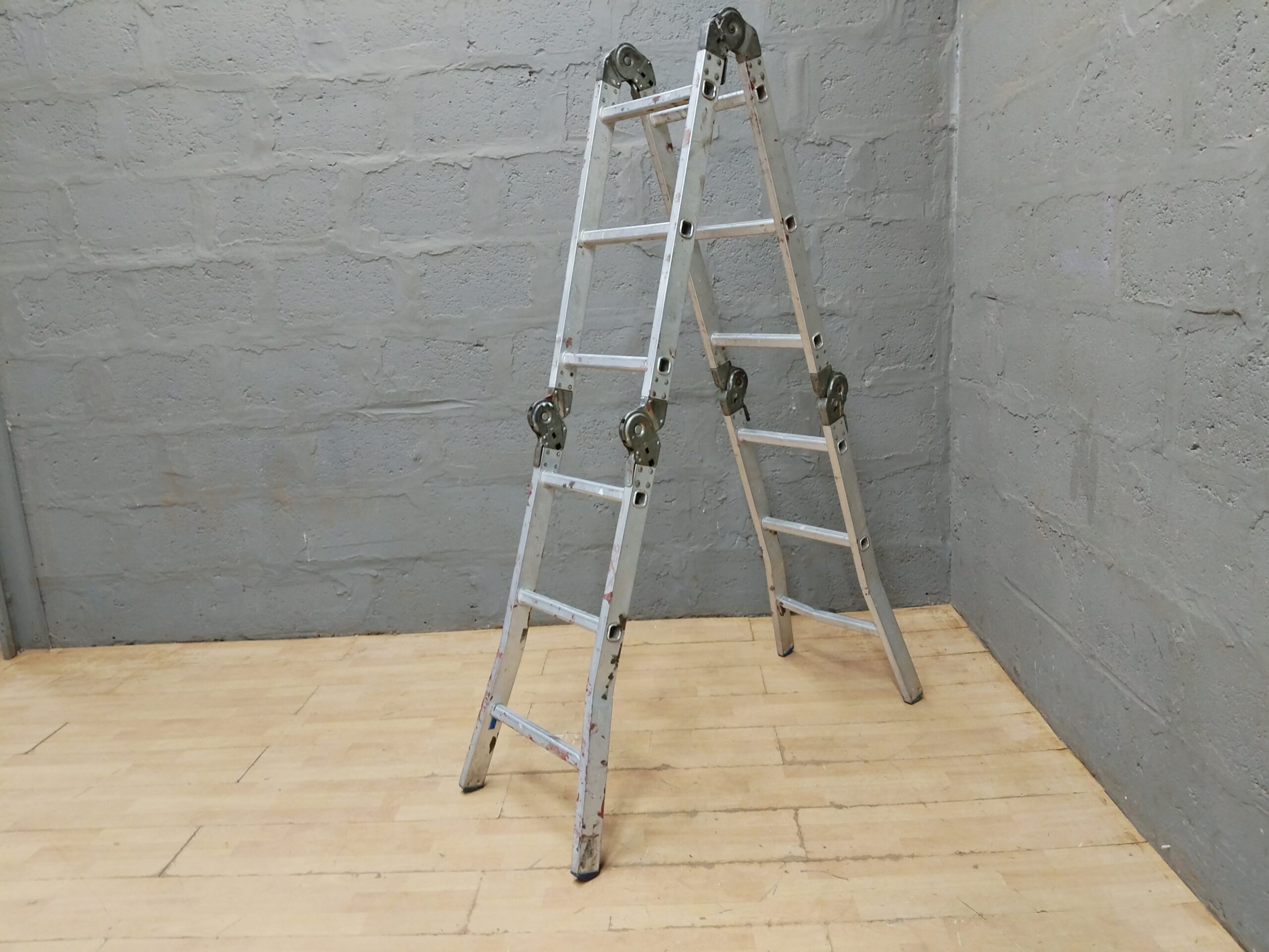 Folding Multi-Position Ladder — Used, Paint-Splattered, Stands Open (Seller-confirmed 1)