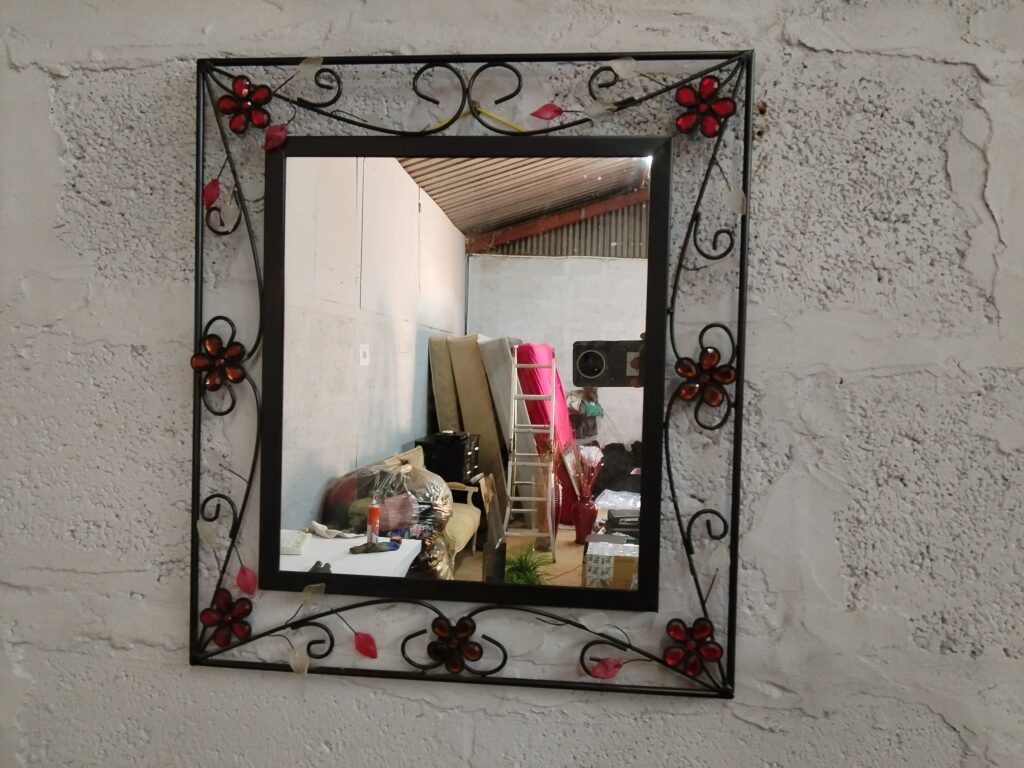 Decorative Floral Wall Mirror with Dark Metal-Look Frame & Red/Amber Gems