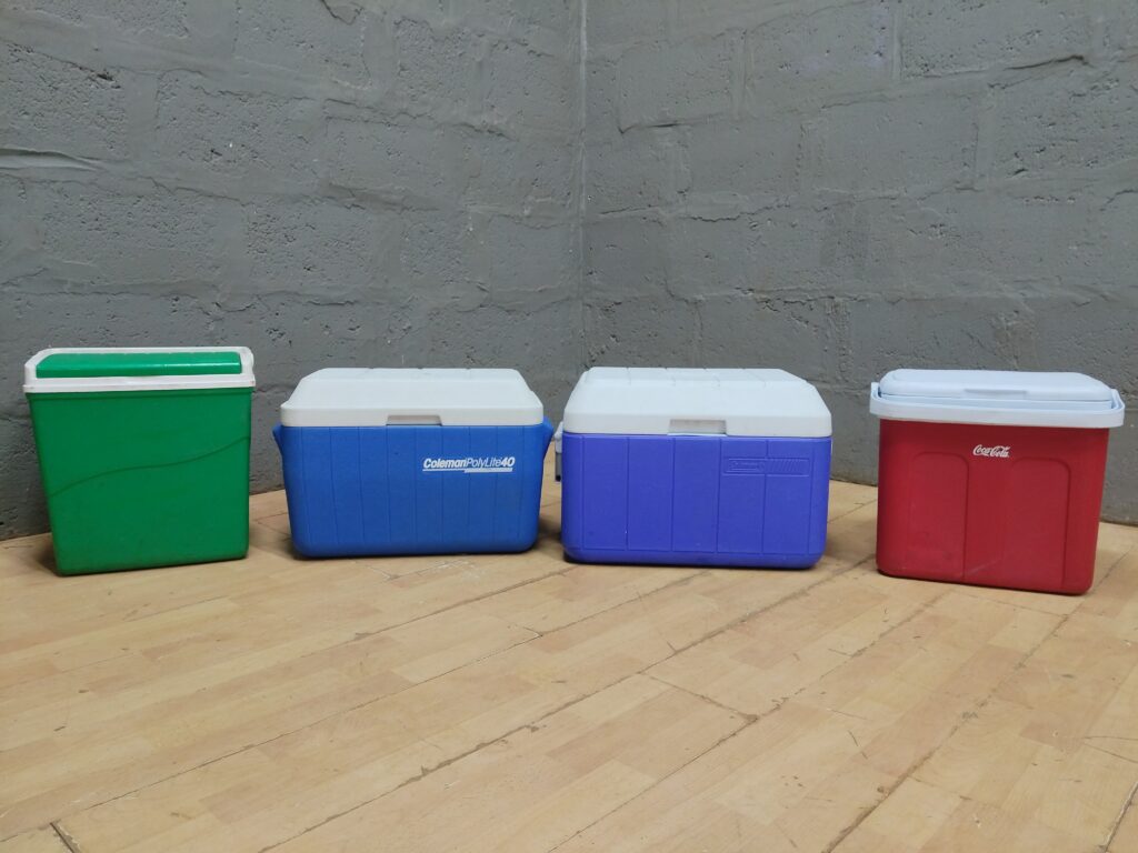 Lot of 4 Coleman-style Plastic Coolers (Blue, Red, Green) — Lids Included