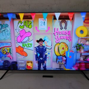 Samsung 70" Flat Screen TV (Model UA70CU7000K) — Powers On, Stand & Remote Included