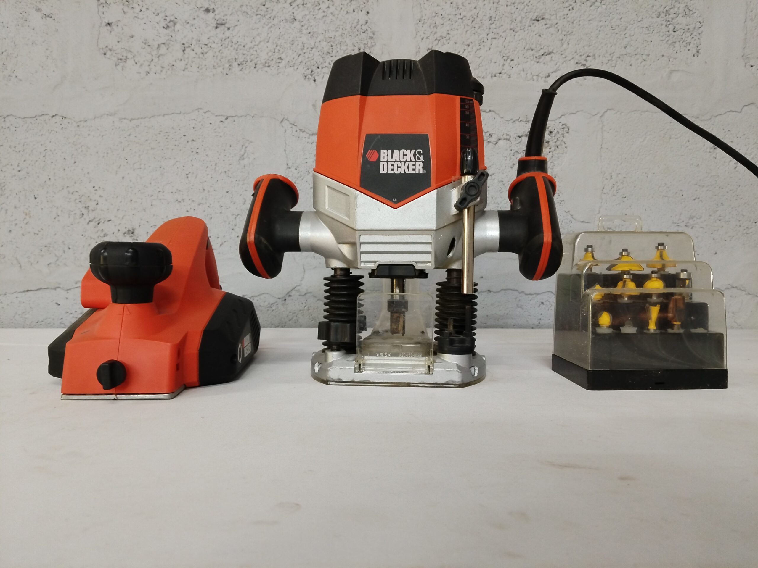 Black & Decker power tools set — plunge router + smaller handheld, 3 bit cases