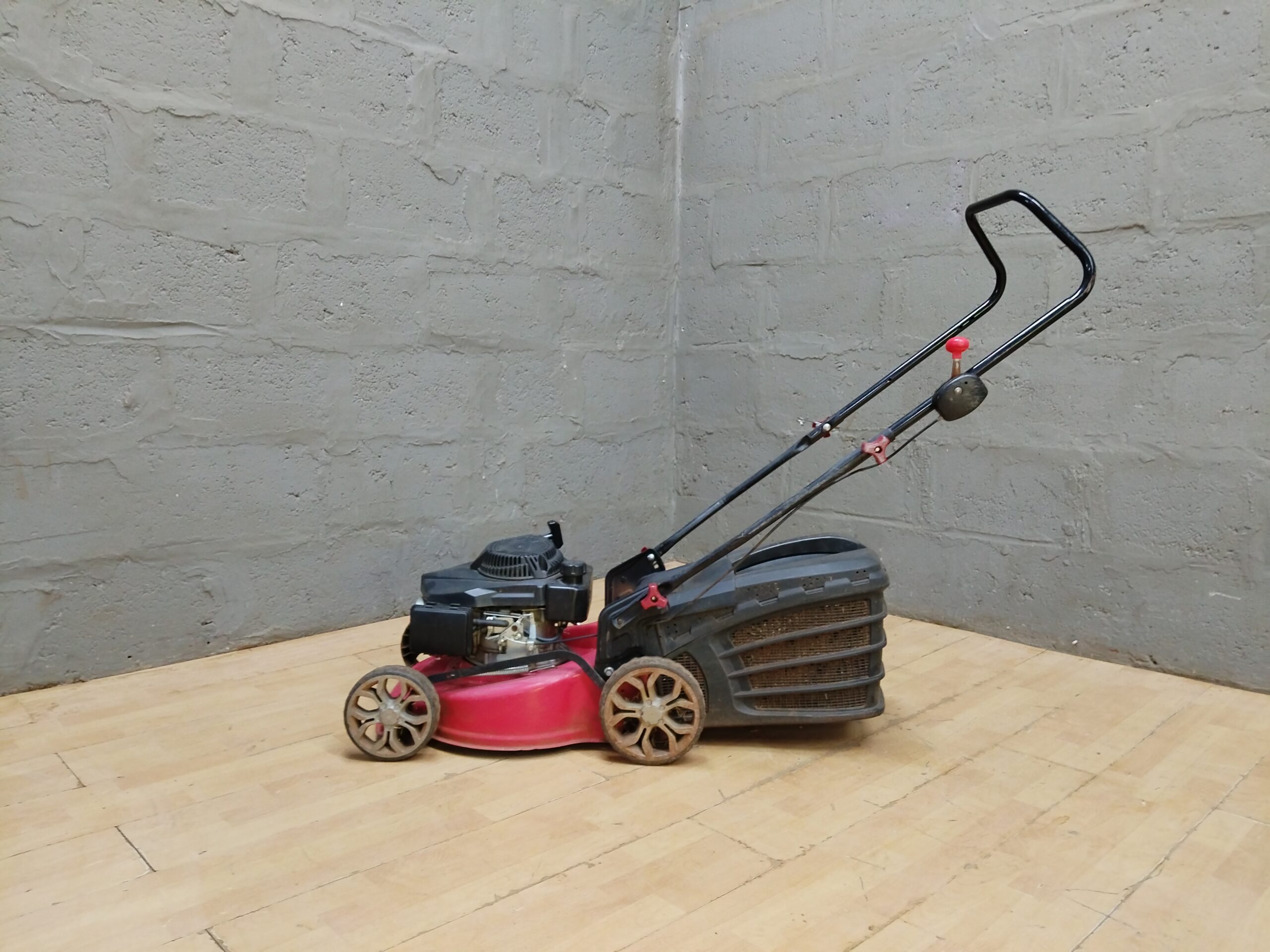 Used Walk-Behind Lawn Mower with Grass Catcher (Red/Pink Deck)