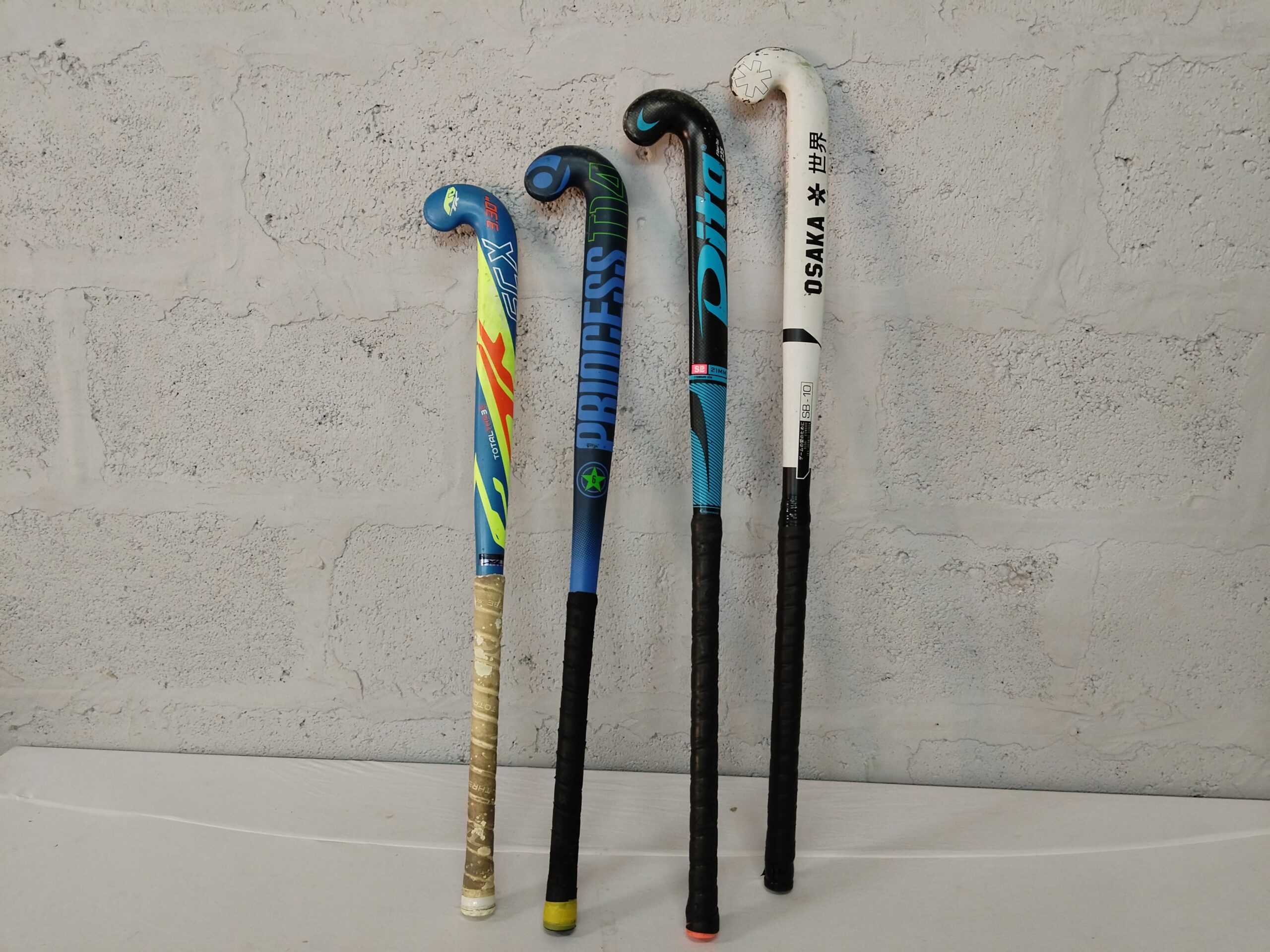 Set of 4 Used Field Hockey Sticks – Mixed Brands (Dita, OSAKA, PRINCESS + neon)