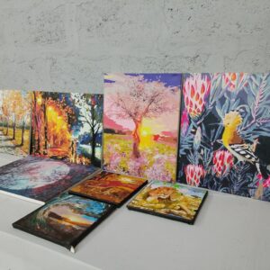 Lot of 7 Assorted Canvas Paintings — Small/Medium, Mixed Subjects