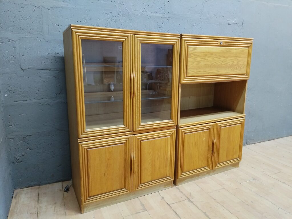 Two-module light-oak display/storage cabinet with glass doors & shelves