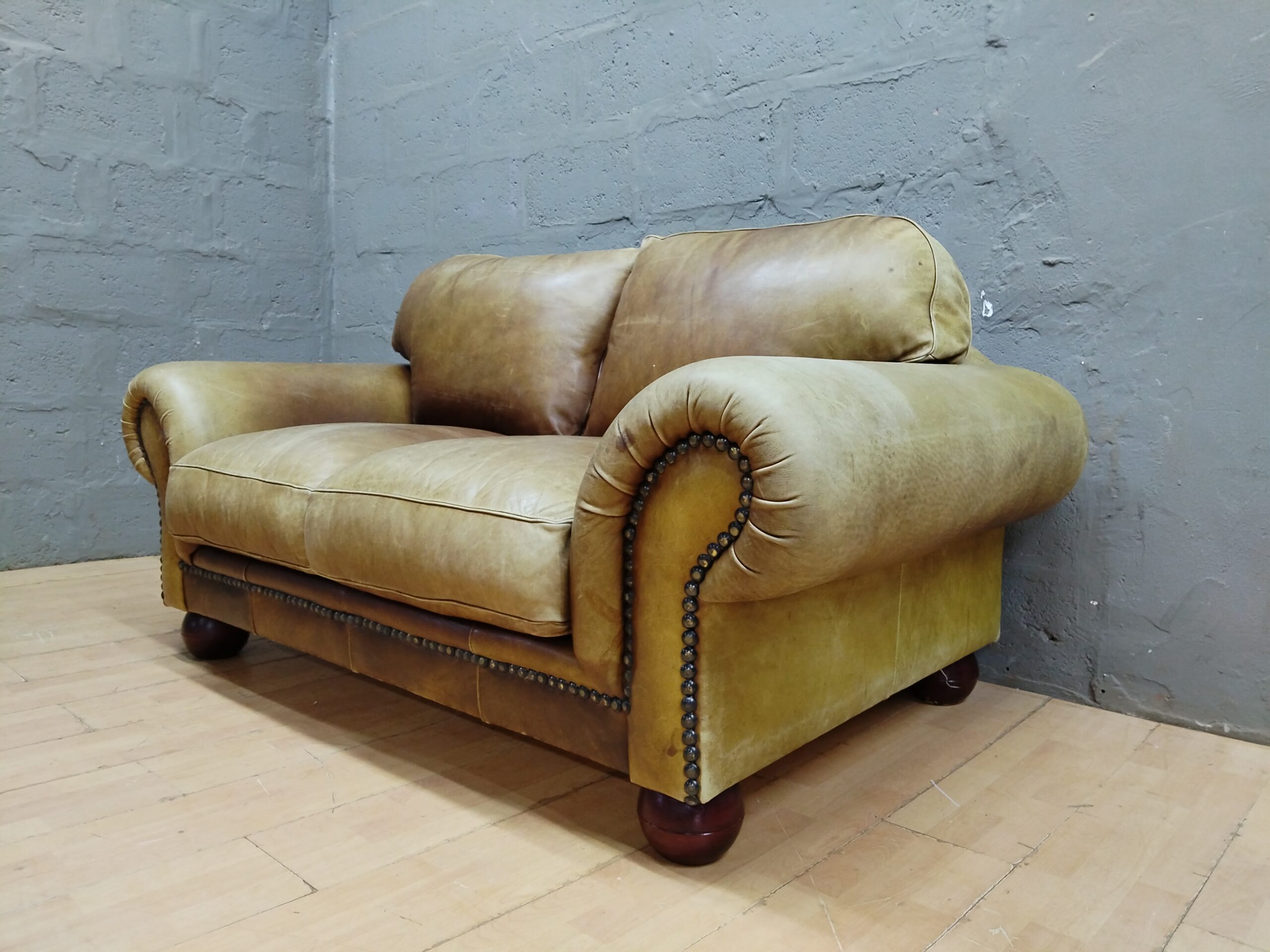 Two-seat Brown Leather-look Loveseat with Nailhead Trim & Wooden Feet