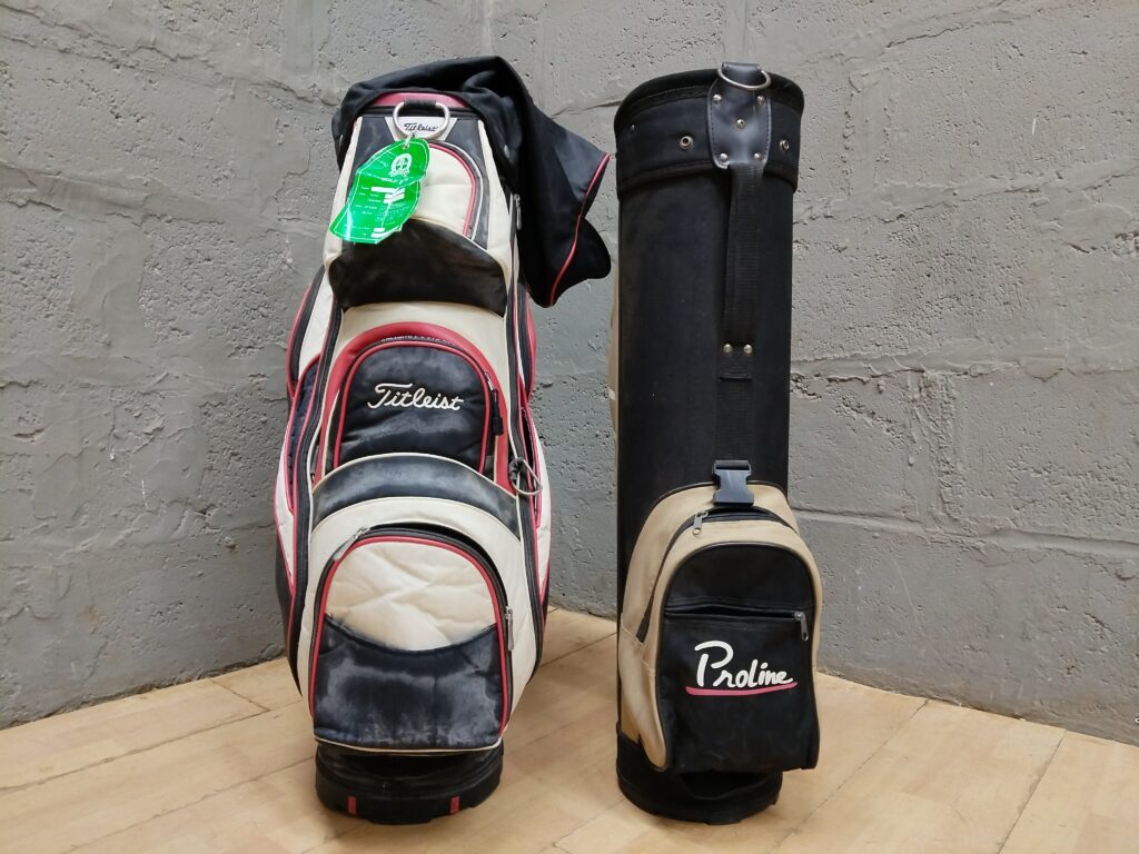 Pair of Used Golf Bags (Titleist and Proline) — Two Bags, Multiple Pockets
