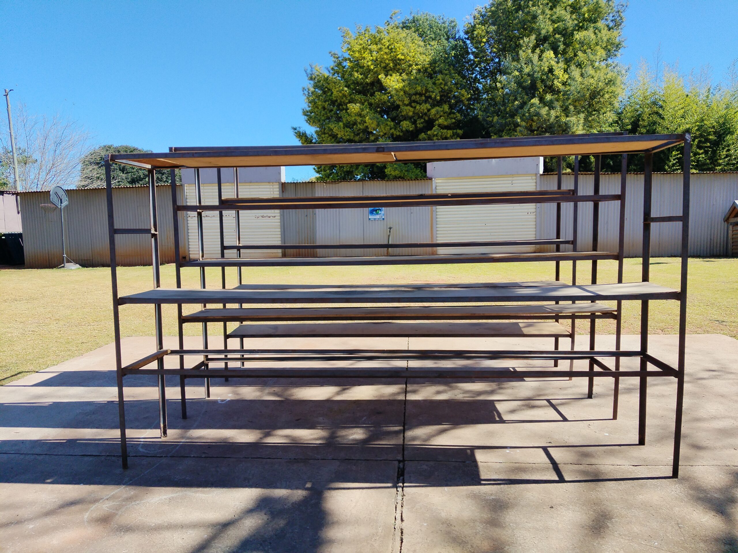Set of Four Industrial Metal Standing Shelving Units (3 Long + 1 Small)