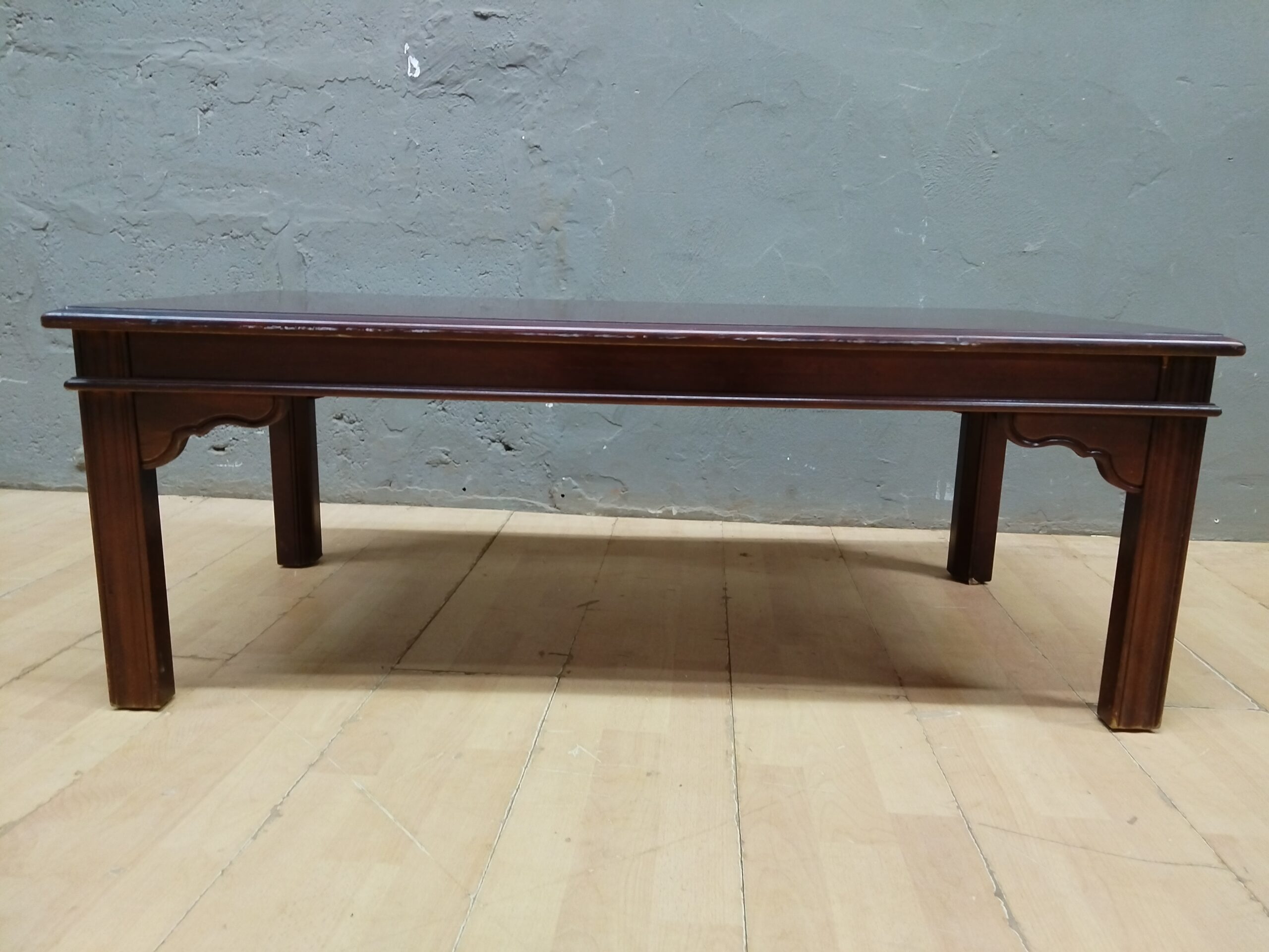 Brown Low / Coffee Table with Visible Surface Scratches — 112 x 56 x 40 cm