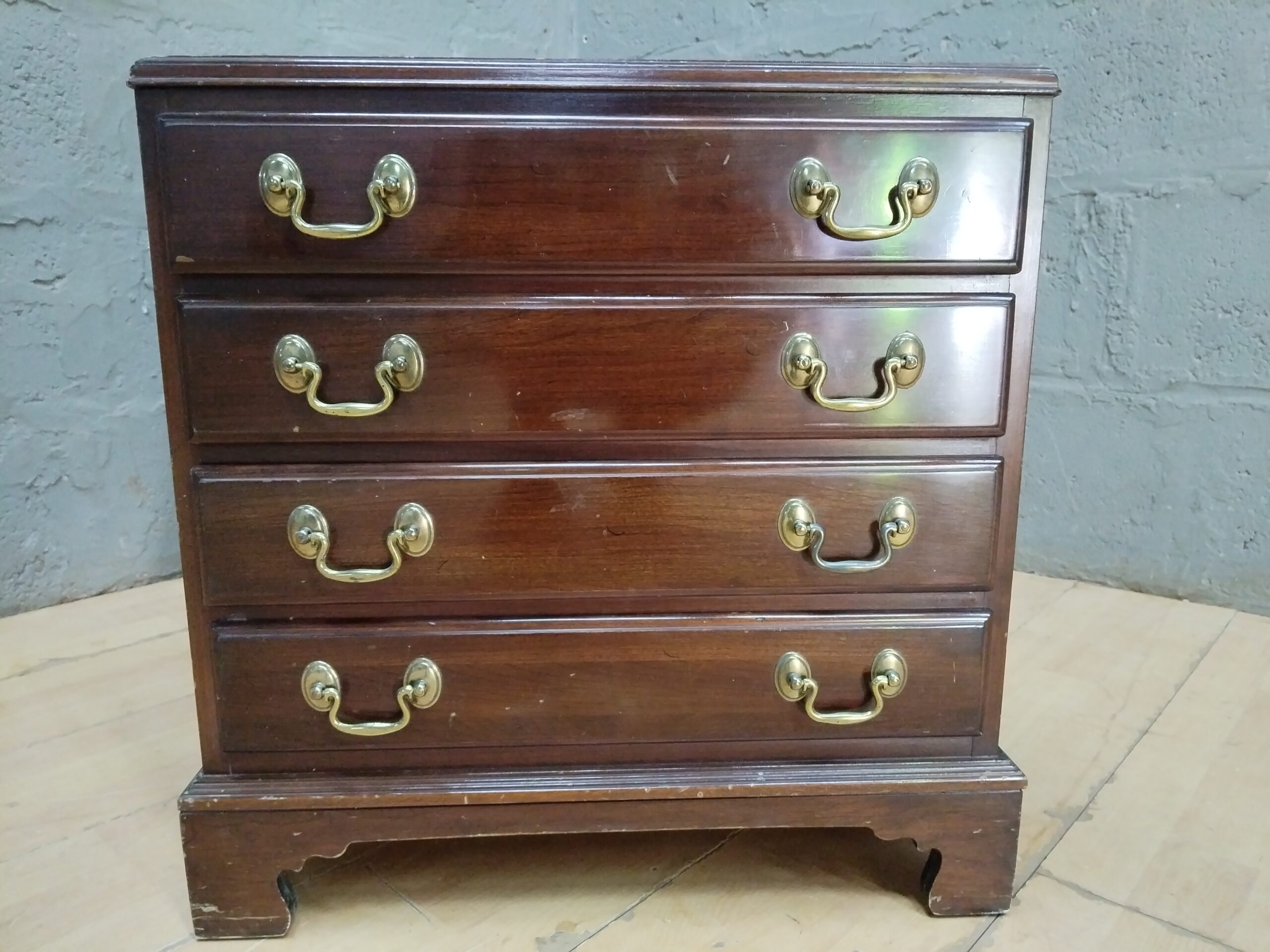 Small Dark-Brown 4-Drawer Wooden Chest with Brass Bail Handles