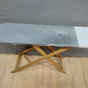 Used Folding Ironing Board with Wooden X-Frame Legs and Grey Cover