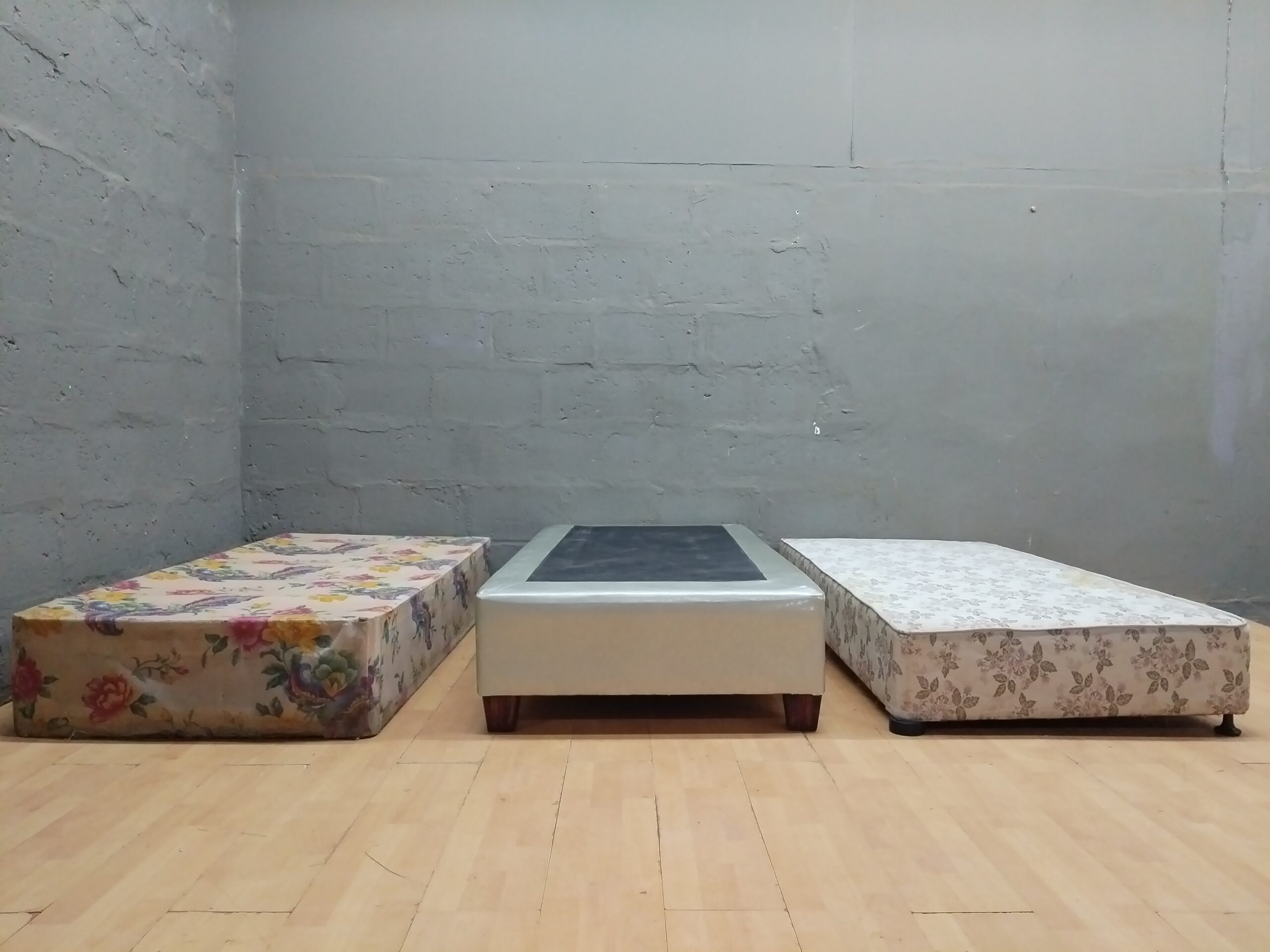 Set of 3 Single Bed Bases – Assorted Upholstery, one missing legs