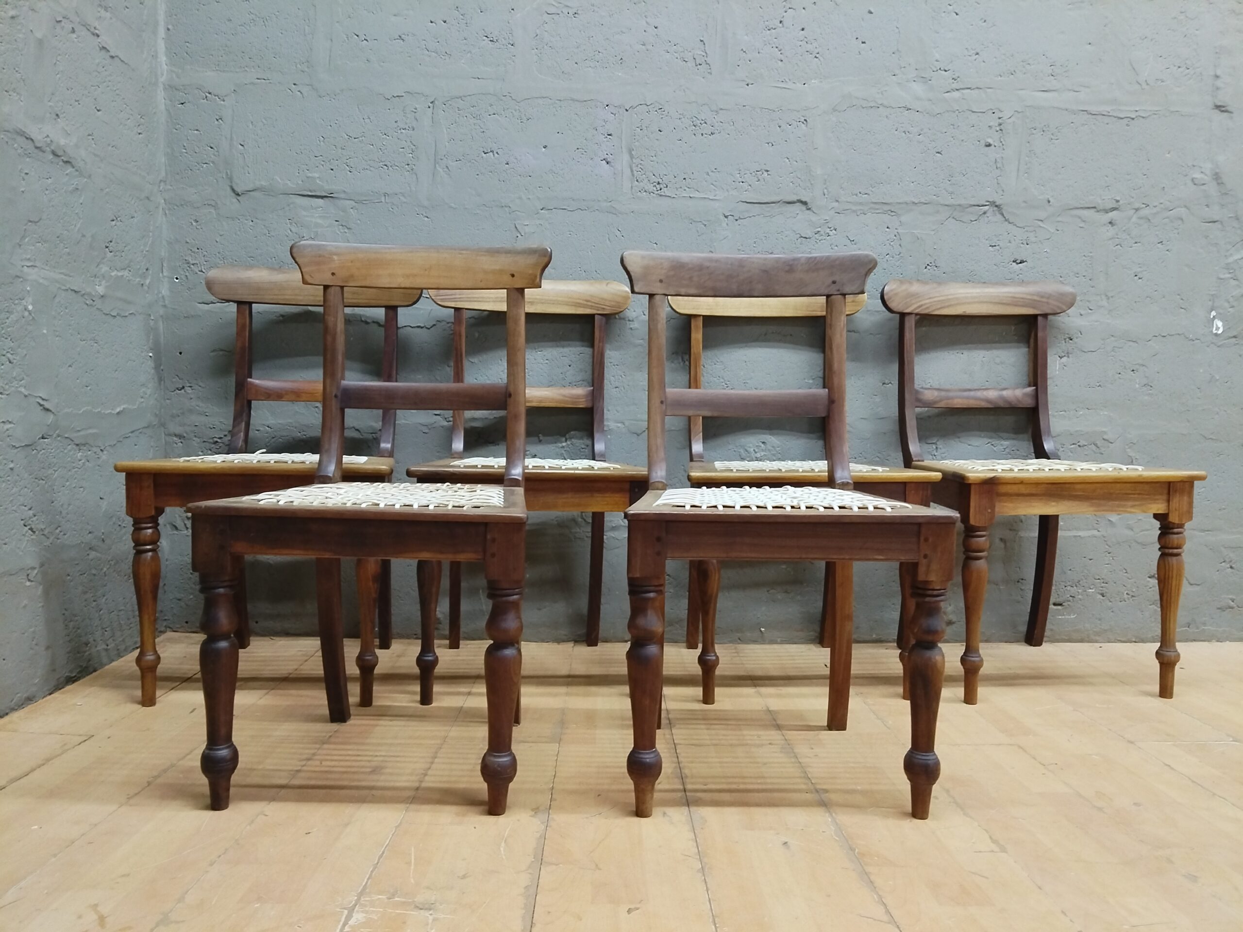 Set of 6 Stinkwood Dining Chairs with Woven Seats — Mixed Finishes, Repair Required