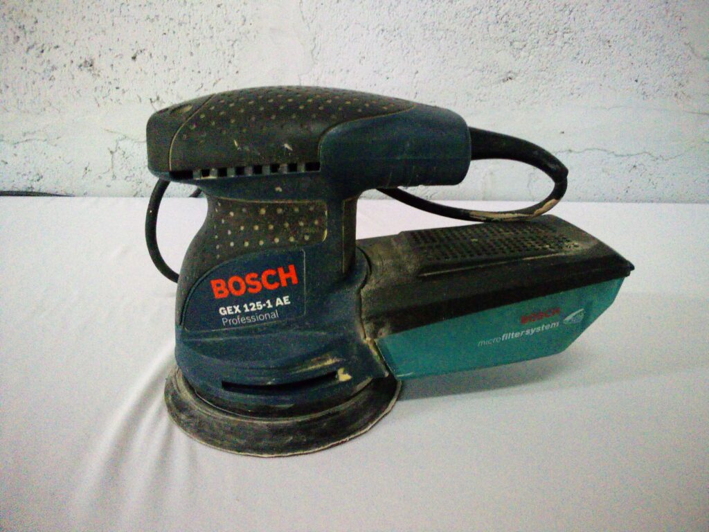 Bosch GEX 125-1 AE Handheld Orbital Sander – Used, Dust Box & Disc Attached