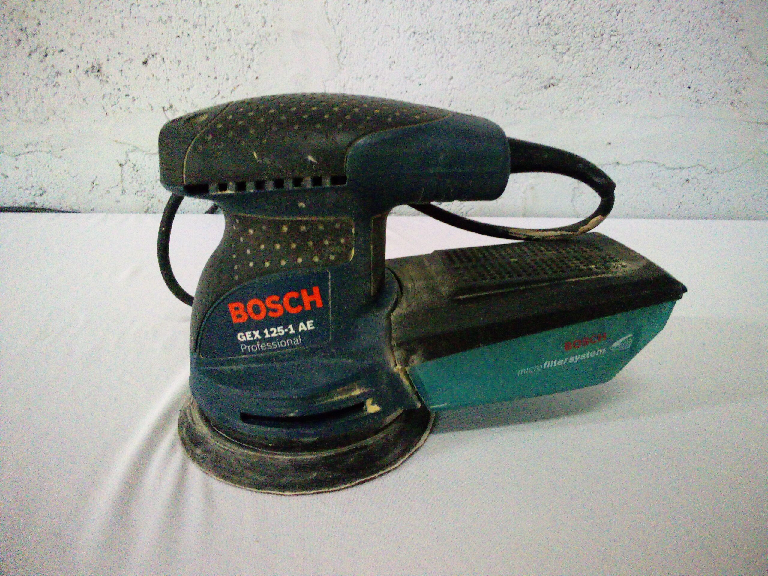 Bosch GEX 125-1 AE Handheld Orbital Sander – Used, Dust Box & Disc Attached
