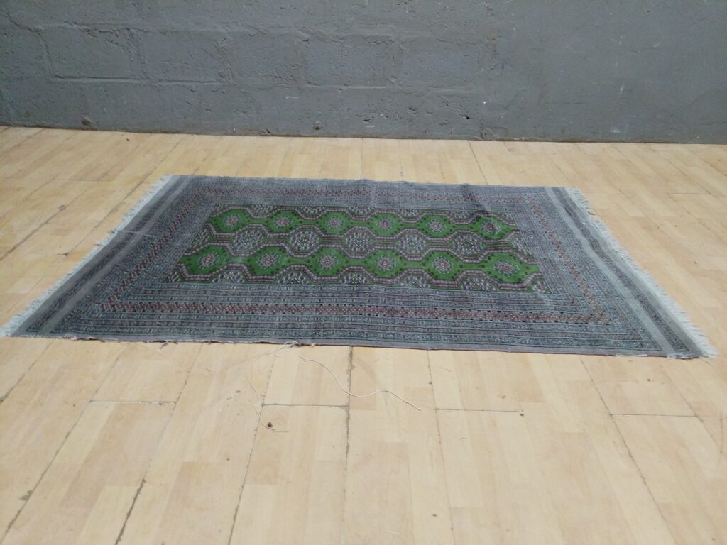 Patterned Green and Brown Rug – 188 x 124cm, Used with Fraying Edges