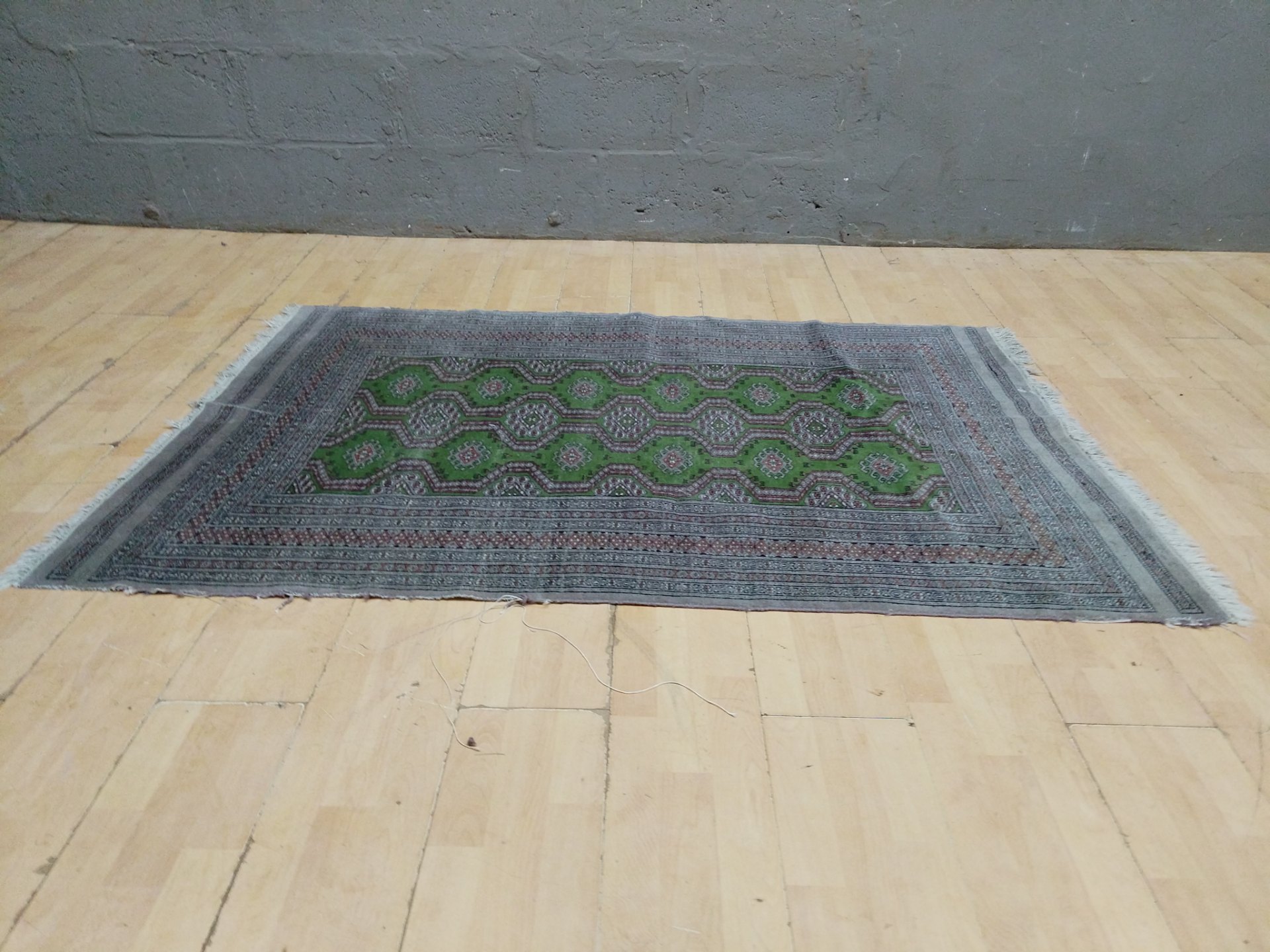 Patterned Green and Brown Rug – 188 x 124cm, Used with Fraying Edges