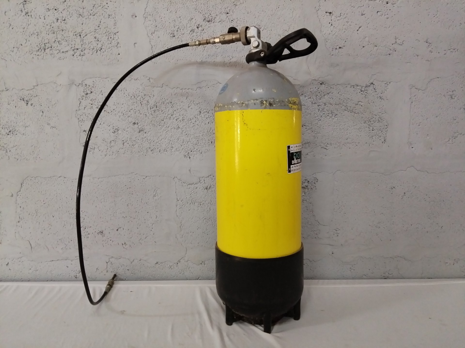 Used 15.0L Compressed Gas Cylinder with Valve, Hose and Base Protector — Untested, Surface Corrosion