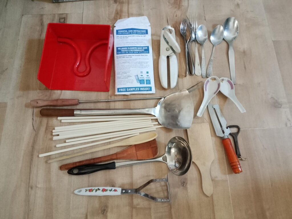 Assorted kitchen utensils lot — 24 pieces (mixed metal, wood, ceramic)