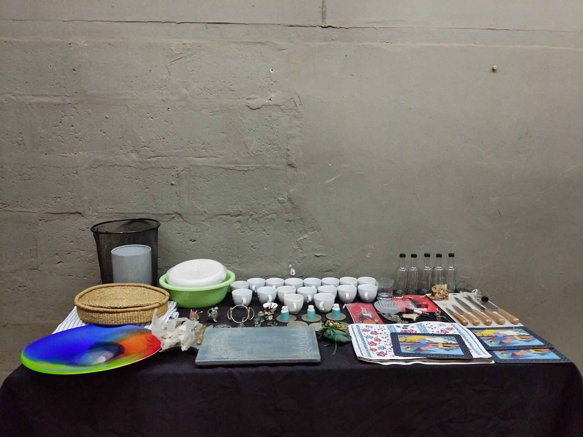 Bulk mixed household lot — cups, glass bottles, knives (57 items, used/mixed condition)