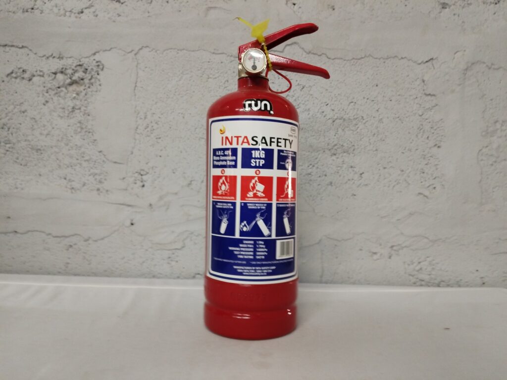 INTASAFETY 1kg ABC Dry Powder Fire Extinguisher – labelled NEW, gauge in green, 1st service due 10/2020