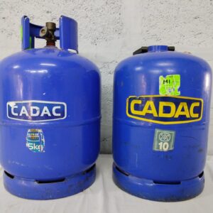 Pair of used CADAC camping gas cylinders — blue (stickers suggest 5kg + 10kg), empty/inspected